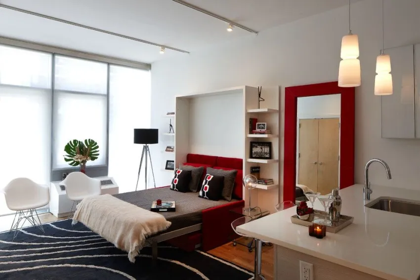 Оптимальное решение для однокомнатной квартиры — встроенная мебель, которая легко трансформируется и занимает меньше места